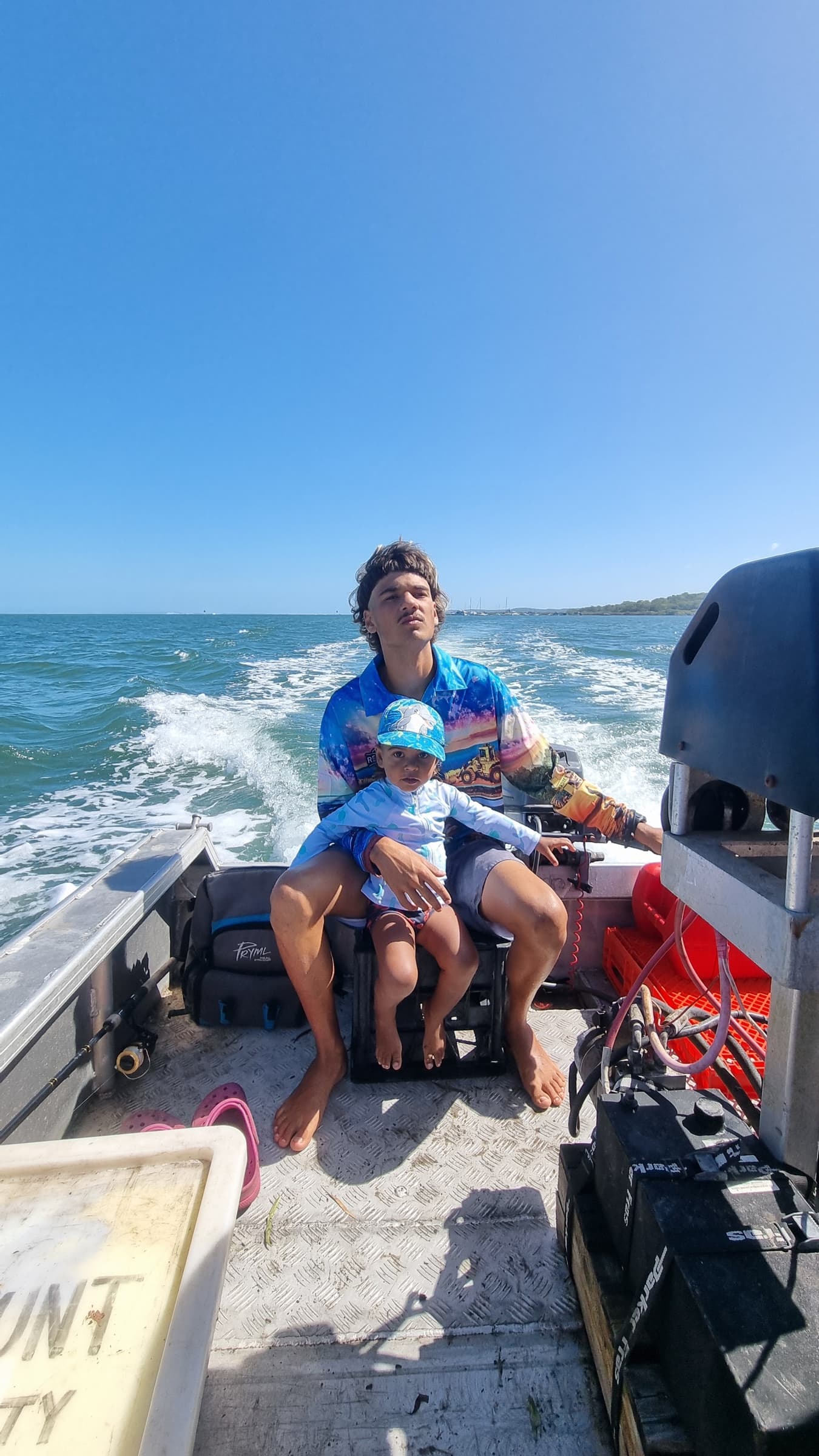 Family on the boat in Quandamooka waters